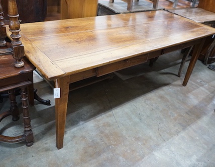 An early 19th century French rectangular fruitwood kitchen table fitted two drawers, length 201cm, depth 80cm, height 76cm